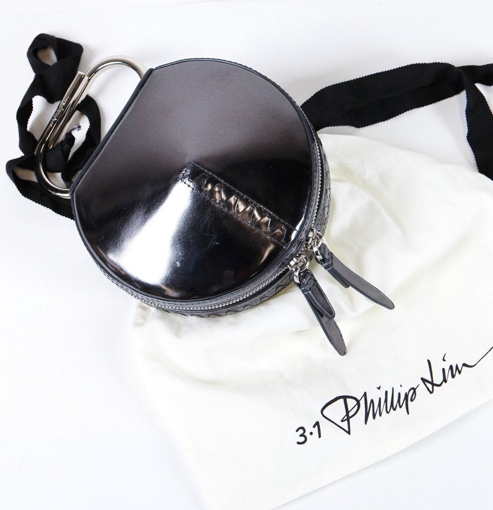 "Alix Circle Clutch"