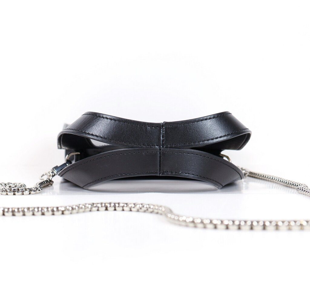 Black leather mini rectangle bag with silver crossbody strap