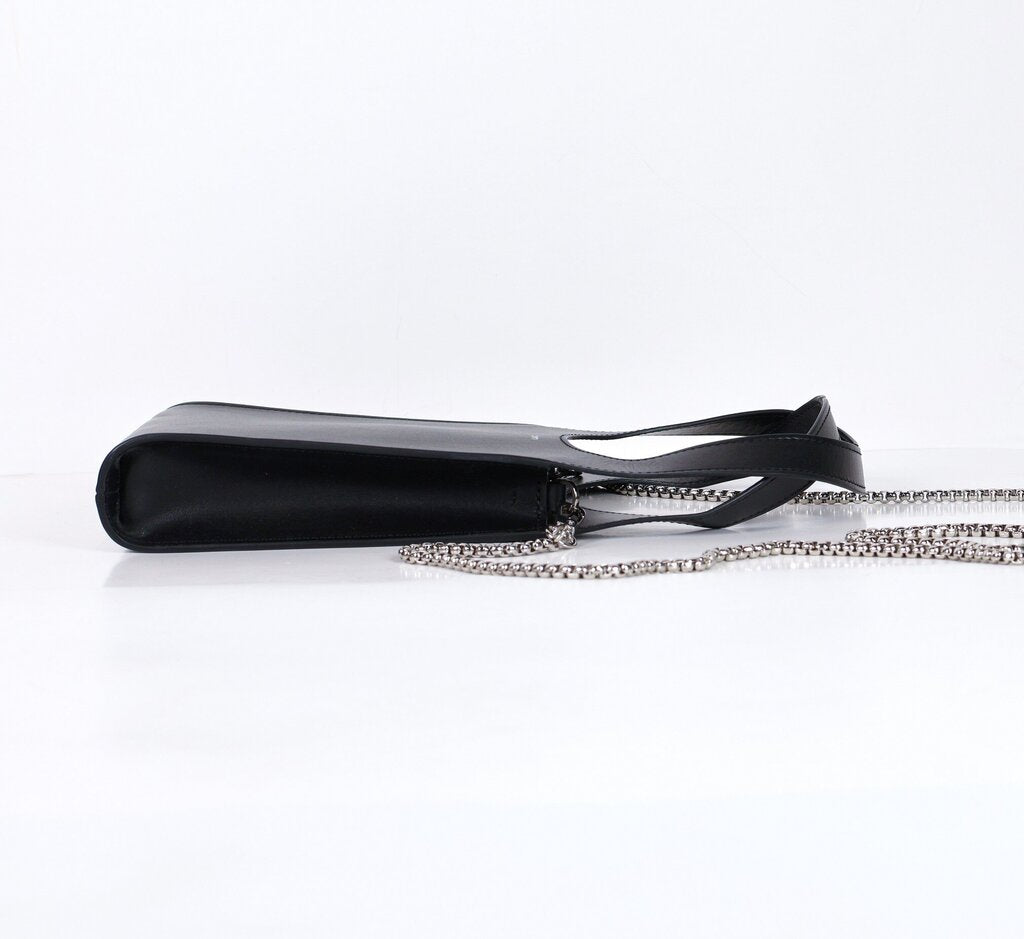 Black leather mini rectangle bag with silver crossbody strap