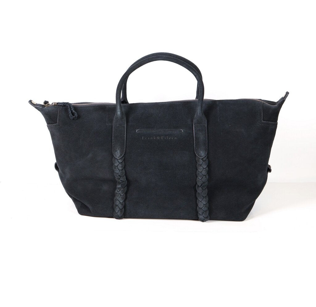 Black suede tote with two small top handles and braided detail on bag