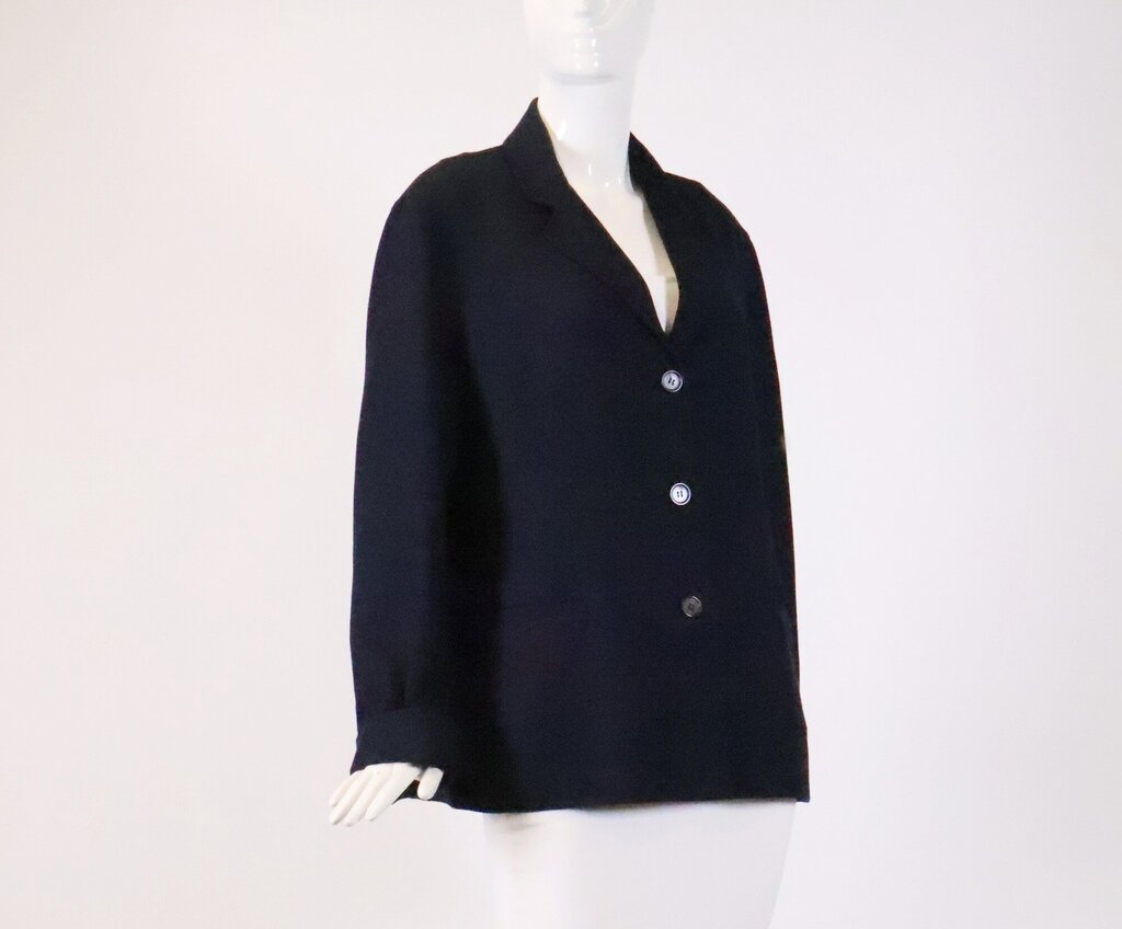 (8) Navy three button stretch blazer