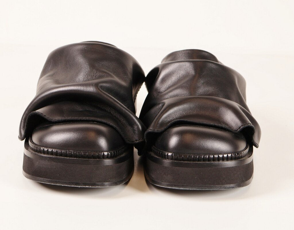 (9.5) Black leather chunky mules with ruffle look