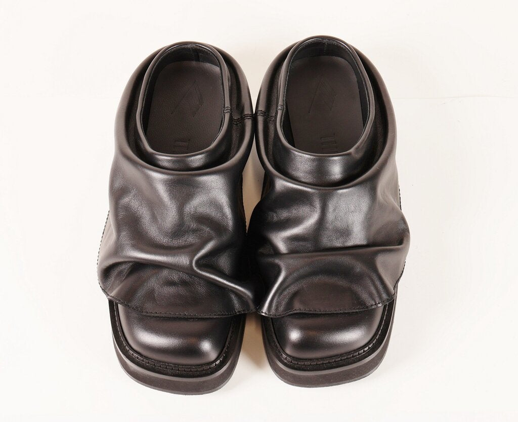 (9.5) Black leather chunky mules with ruffle look