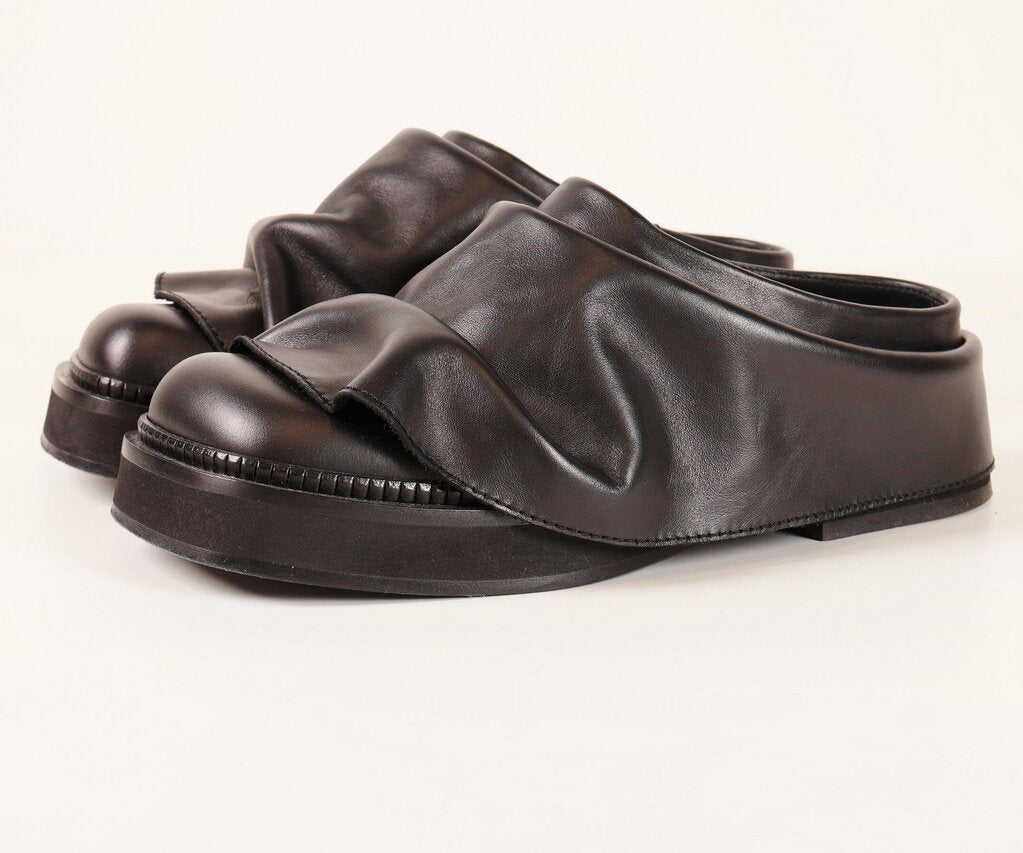 (9.5) Black leather chunky mules with ruffle look