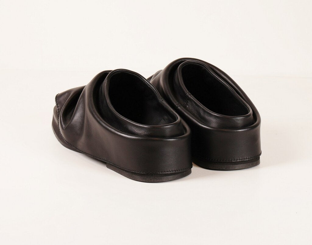 (9.5) Black leather chunky mules with ruffle look