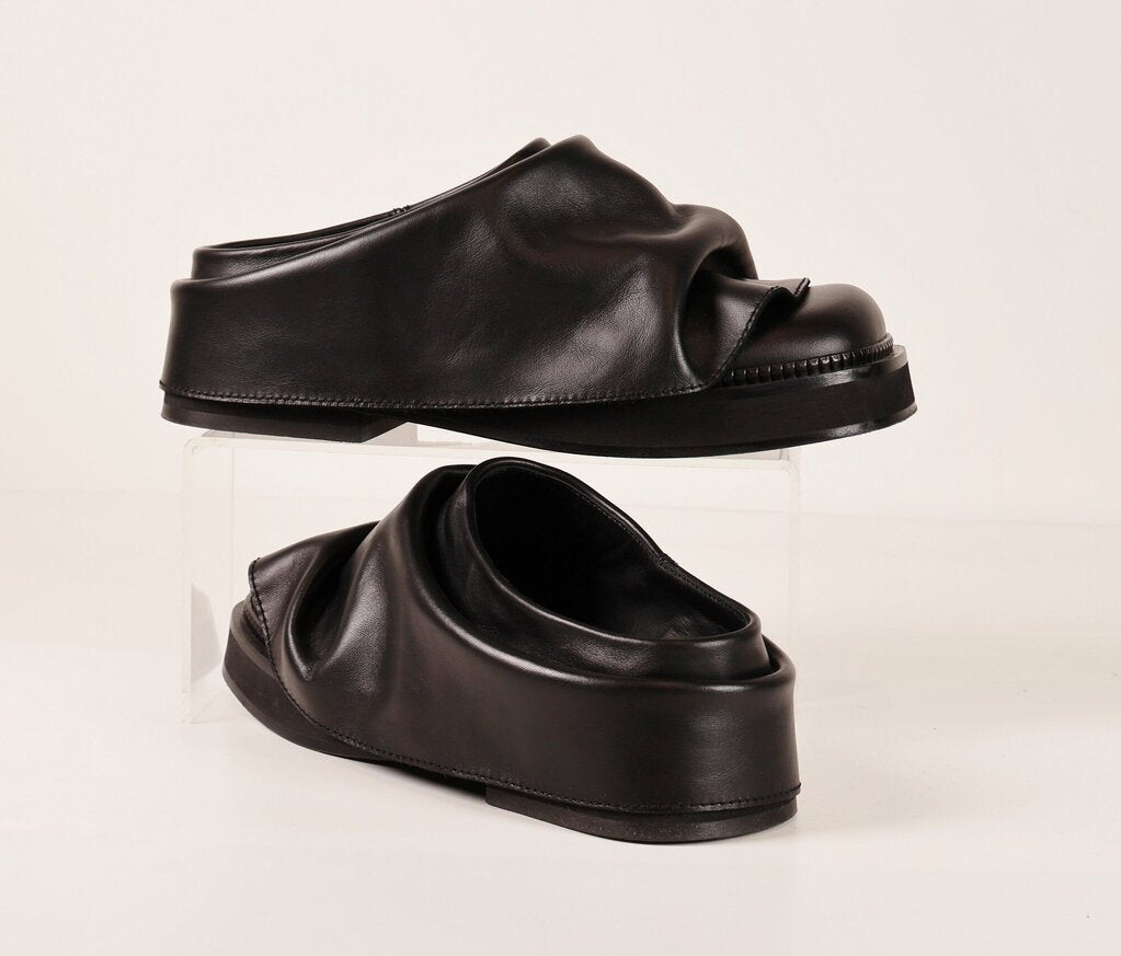 (9.5) Black leather chunky mules with ruffle look