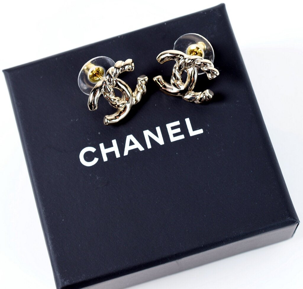 L25 C Gold Tone Twisted Logo Stud Earrings