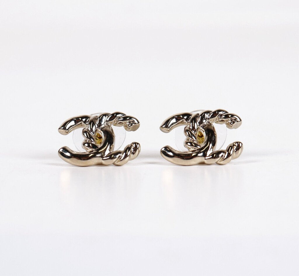 L25 C Gold Tone Twisted Logo Stud Earrings