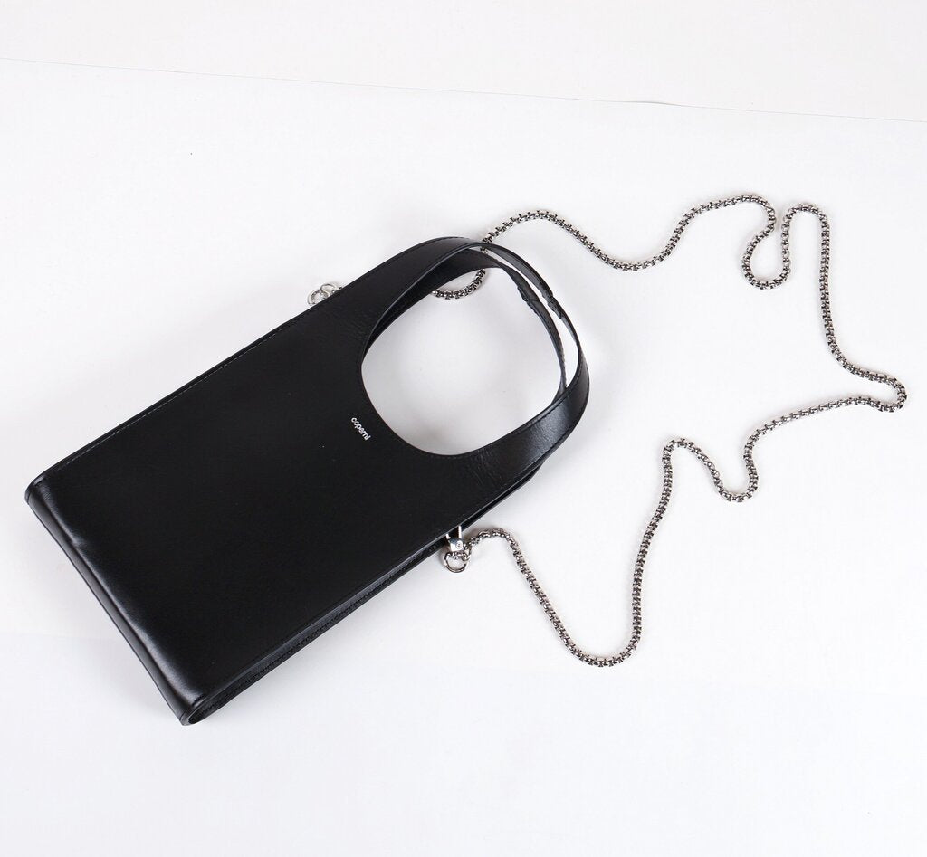 Black leather mini rectangle bag with silver crossbody strap