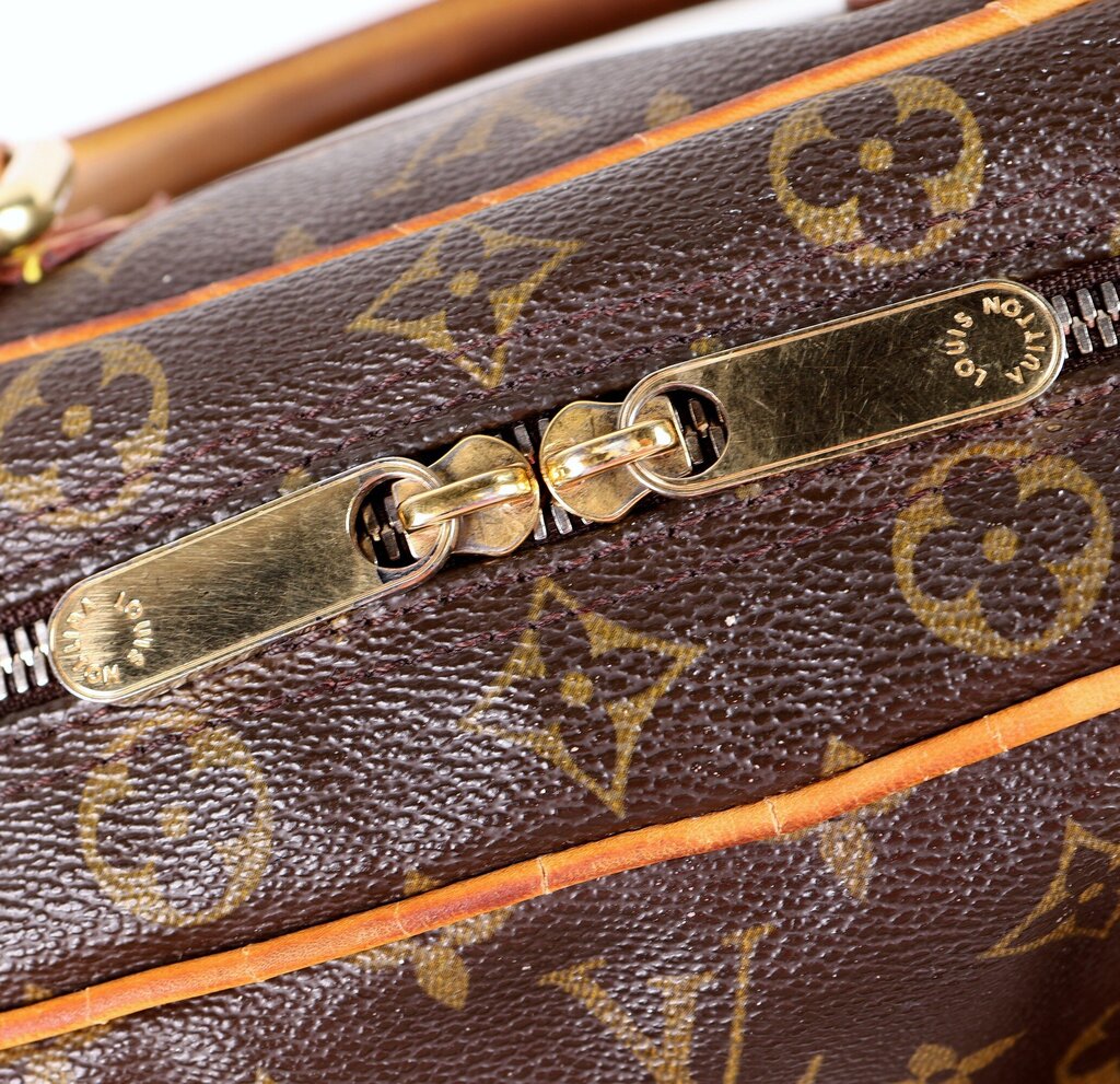 Brown Monogram "Manhattan PM" Bag