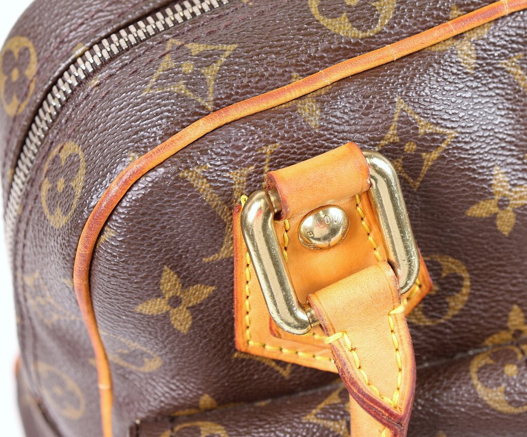 Brown Monogram "Manhattan PM" Bag