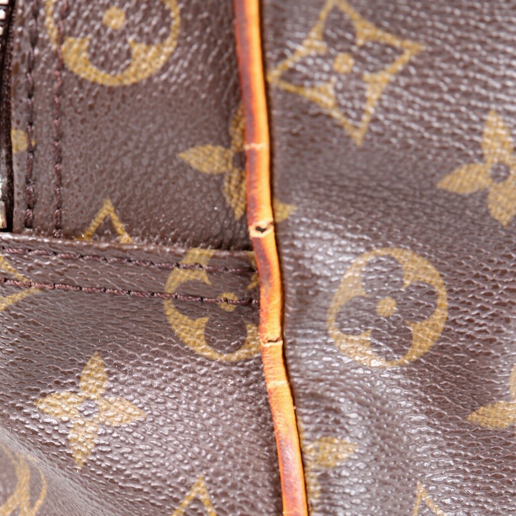 Brown Monogram "Manhattan PM" Bag