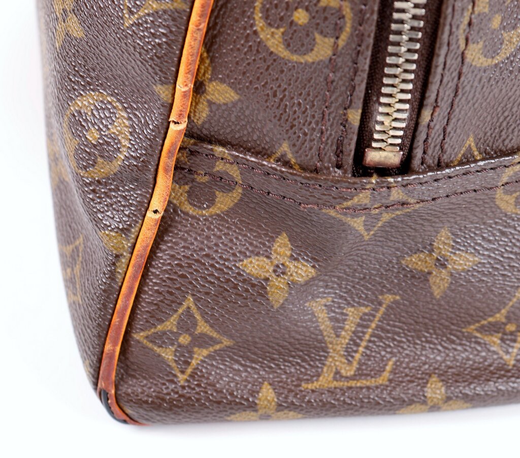 Brown Monogram "Manhattan PM" Bag