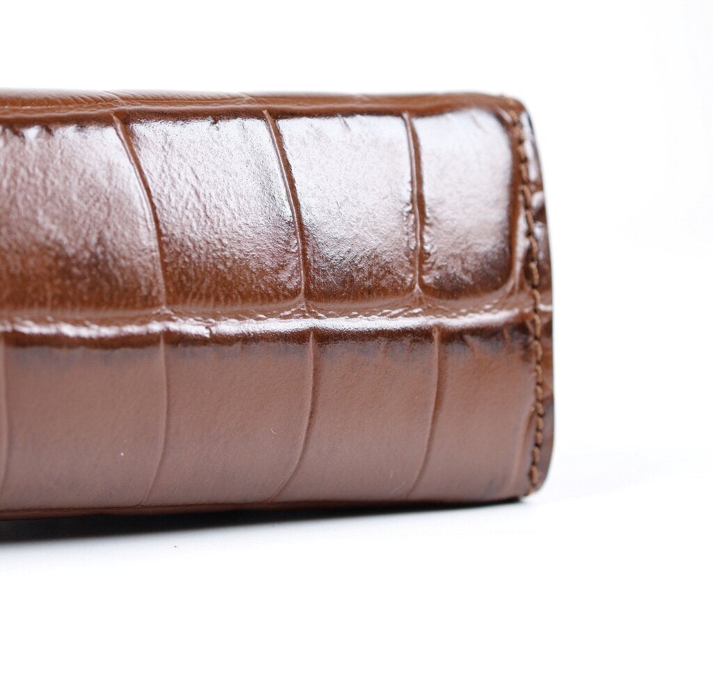 Crocodile Embossed Kiss Lock Clutch